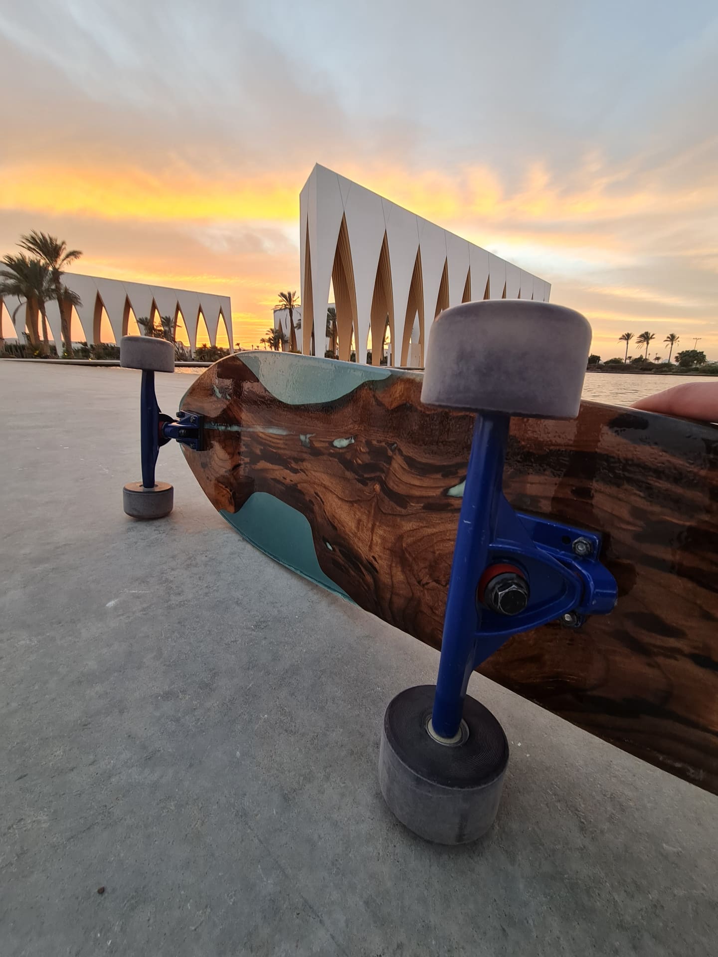Tide Runner handmade wood and cyan resin artwork longboard — view 2