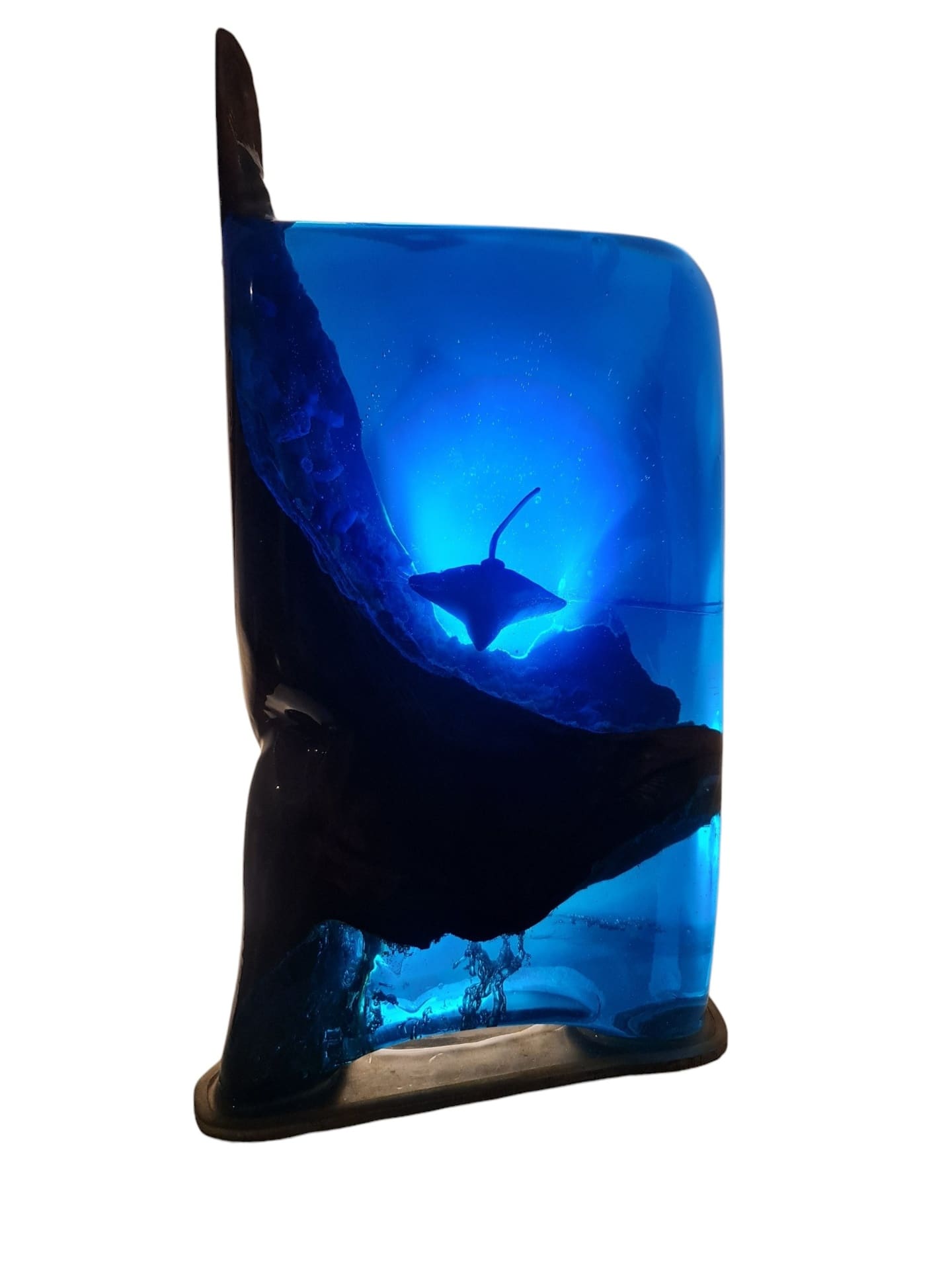 Deep Current resin sculpture with stingray and coral cast in glowing deep blue resin and natural wood — view 1