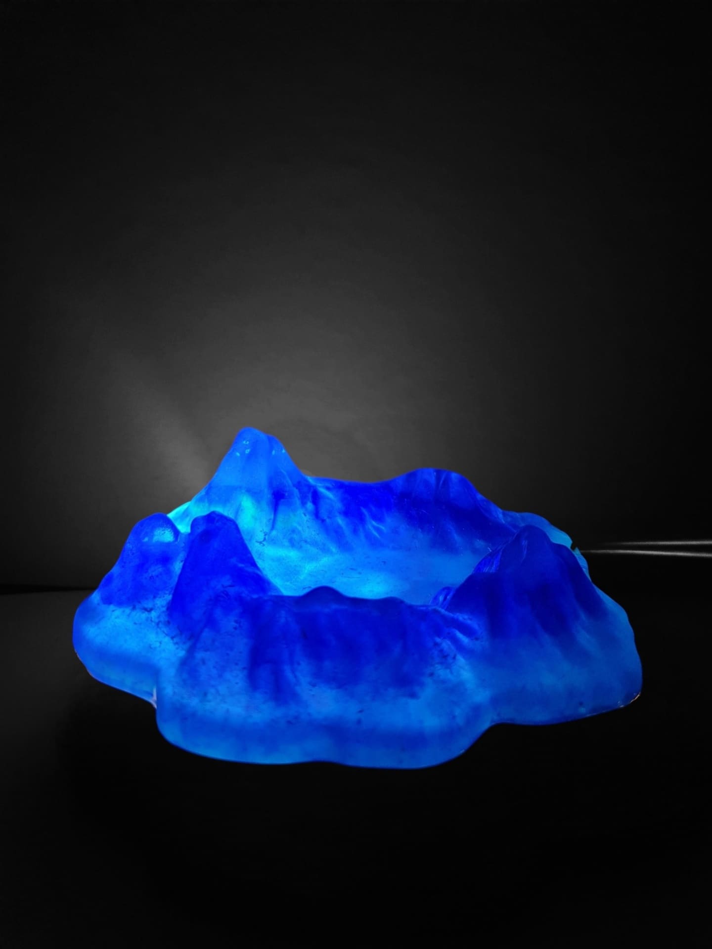 Snow Glacier luxury blue resin cigar ashtray on a dark background — view 1